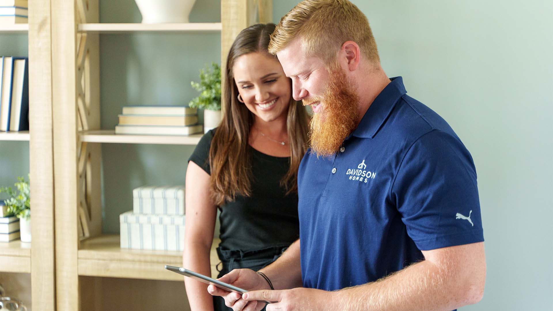 Davidson Homes Customer Care team member assists homeowner